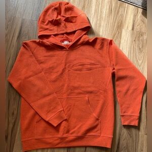 Size 12, orange waffle print lululemon sweatshirt